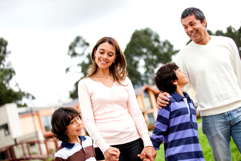 Beautiful family taking a walk and looking happy